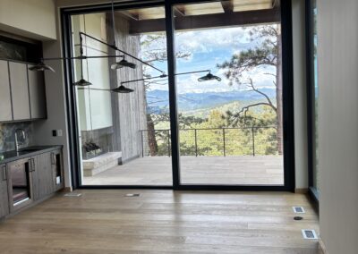 A sliding glass door on a modern house from the interior
